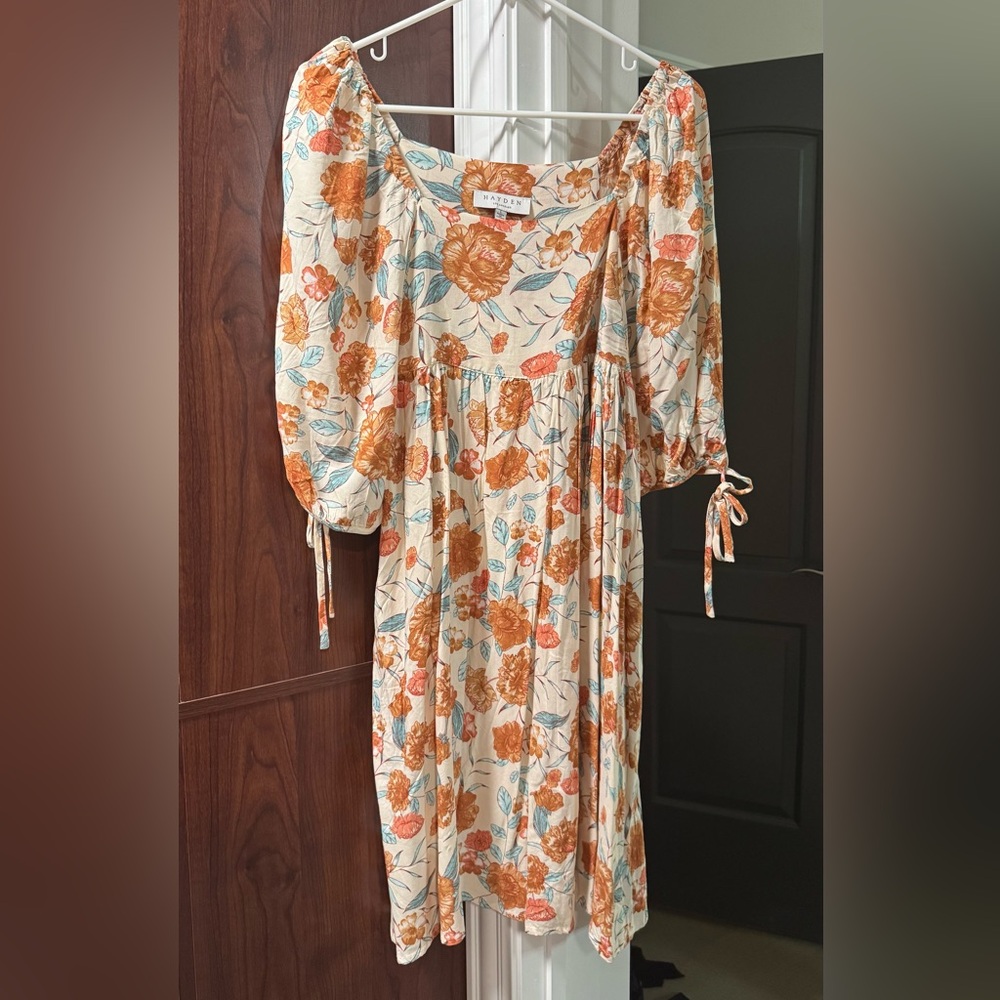 Brand new never worn Hayden Cream babydoll Dress w/ Orange & Blue Floral Design